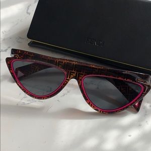 Brand New Fendi Sunglasses with neon pink trim.